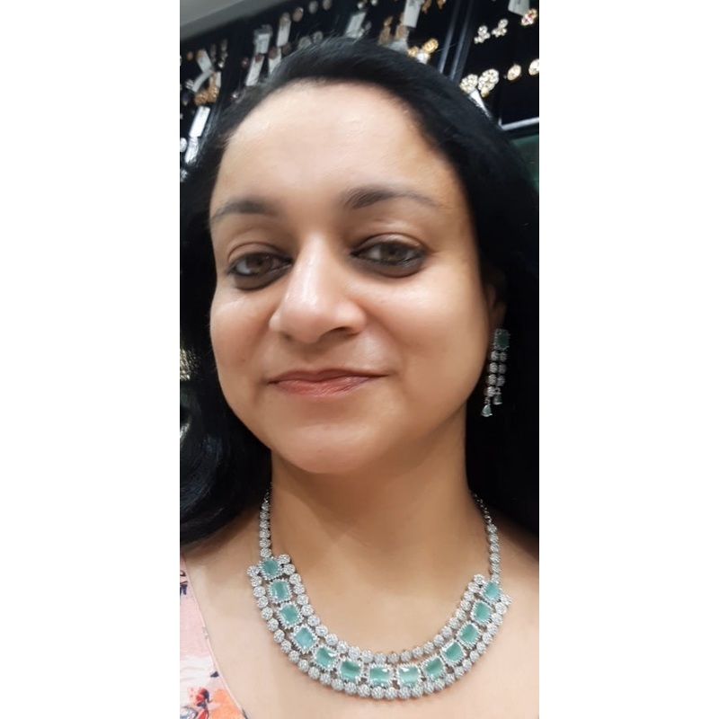 Jewelshingar light green color necklace set in diamond look (93743NAD)