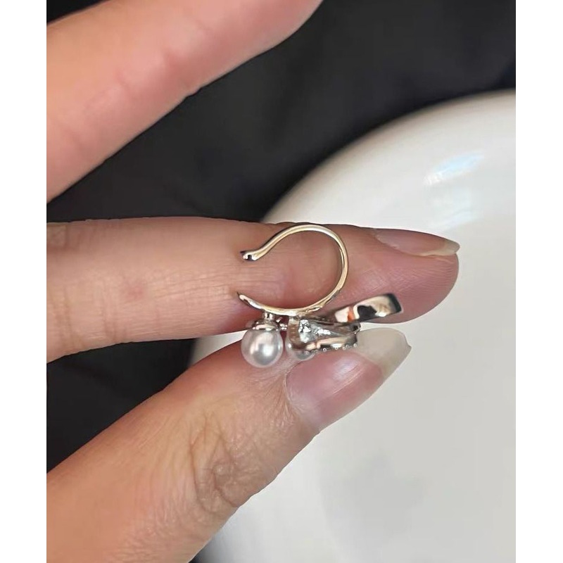 Unique White Metal Zircon Pearl Hollow Out Bow Stud Earrings